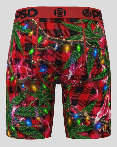 Red and black plaid boxer shorts with colorful Christmas lights, evergreen branches, and red PSD waistband.