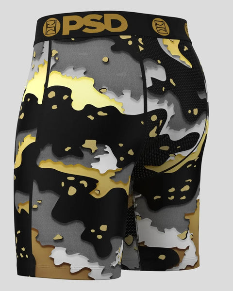 PSD brand shorts with yellow, gray, black and white camouflage pattern and mesh side panels.