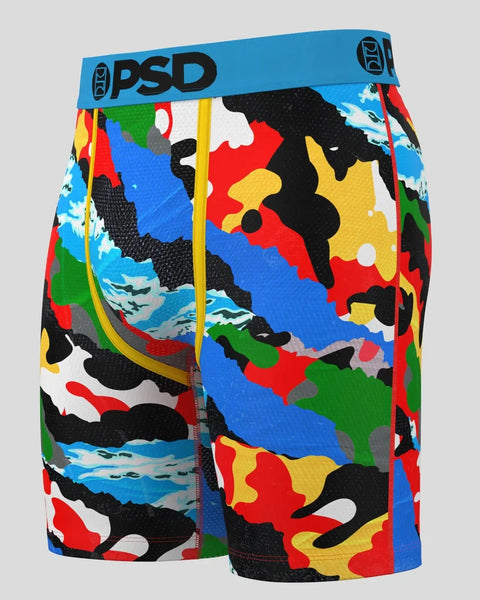 PSD boxer brief with blue waistband and multicolored abstract camouflage pattern in red, yellow, black, blue, and green.