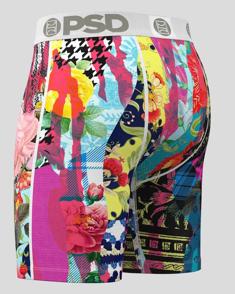 PSD boxer shorts with multicolored patchwork design featuring floral, houndstooth, and geometric patterns.