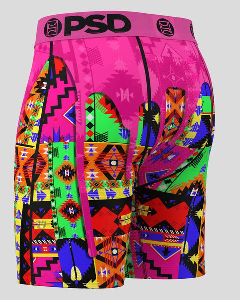 PSD boxer briefs with bright pink waistband and multicolored tribal geometric patterns in neon green, orange, blue, and yello