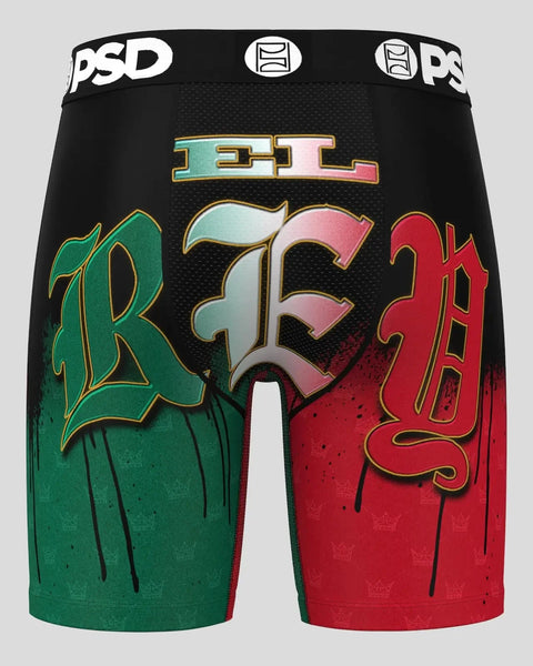 Black shorts with green and red color-blocked panels featuring ornate gold lettering and PSD waistband.