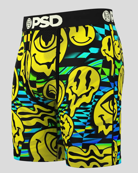 PSD boxer briefs with yellow smiley face and wavy designs on black background with cyan and green geometric patterns.