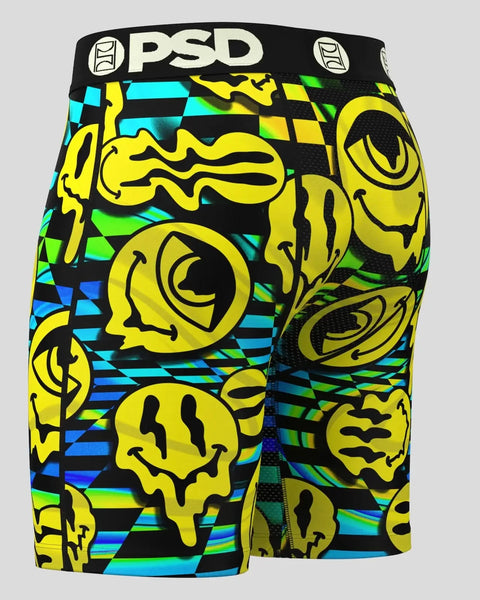 PSD boxer briefs with yellow melting face graphics, cyan and green geometric patterns on black background.