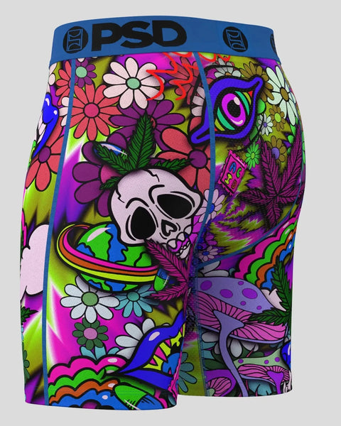 PSD brand shorts with colorful floral and skull print in neon pink, green, blue, and purple throughout.