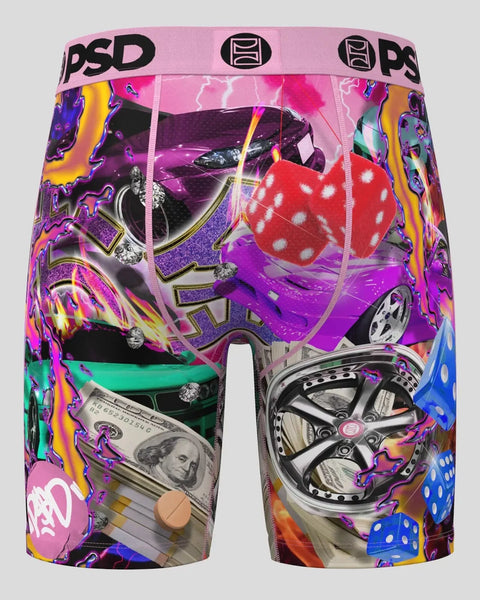 PSD boxer briefs with pink waistband featuring colorful collage of cars, dice, money, and abstract graphics.