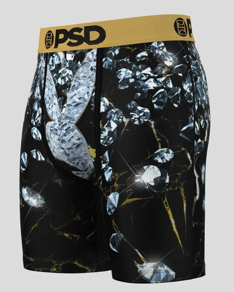 Black boxer briefs with blue and white floral print, gold PSD waistband, and mesh side panels.