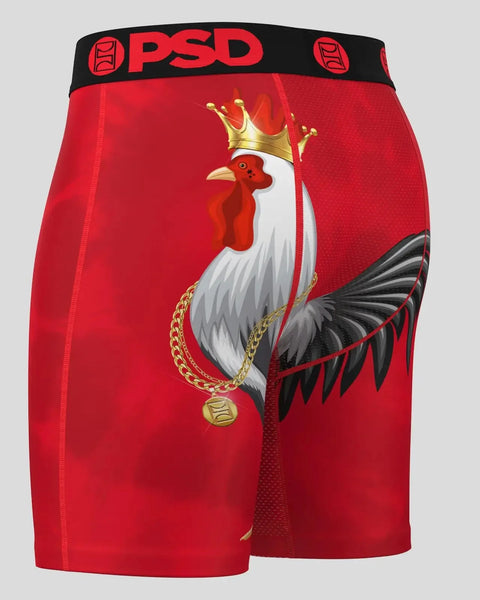 Red PSD boxer briefs with rooster illustration wearing crown and chain necklace on front.