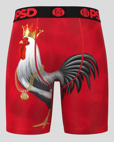 Red boxer briefs with PSD waistband featuring illustrated rooster wearing crown and gold chain.