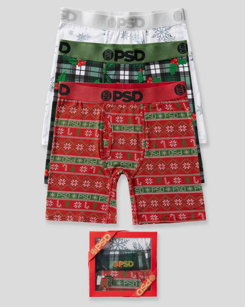 Three PSD modal boxer briefs with snowflake and plaid Christmas patterns in white, green, and red.