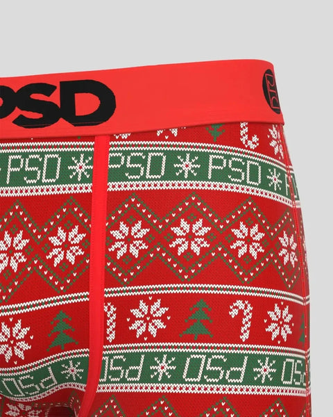 Red sweater with green and white knit pattern featuring snowflakes, trees, and PSD branding.