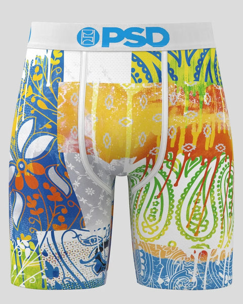 PSD brand boxer briefs with multicolored abstract paisley and floral patterns in blue, yellow, orange, and green.