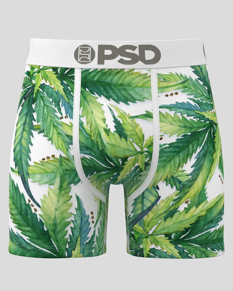 PSD brand boxer briefs with green and yellow leaf print on white background.