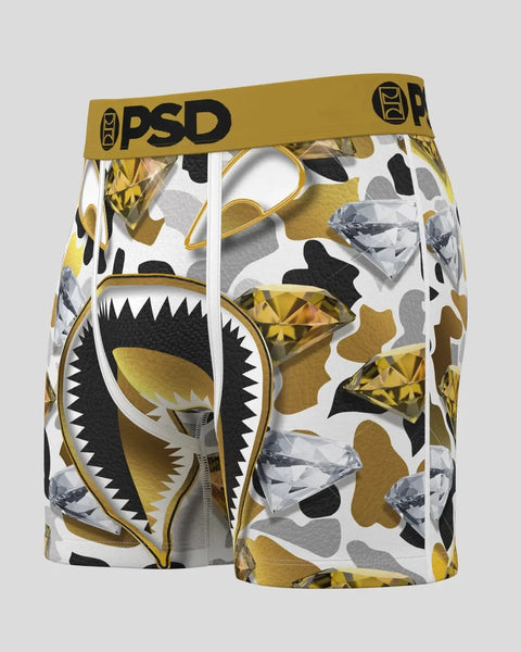PSD Warface Gold boxer briefs with gold waistband, featuring geometric shark and crystal print in gold, black, and white.