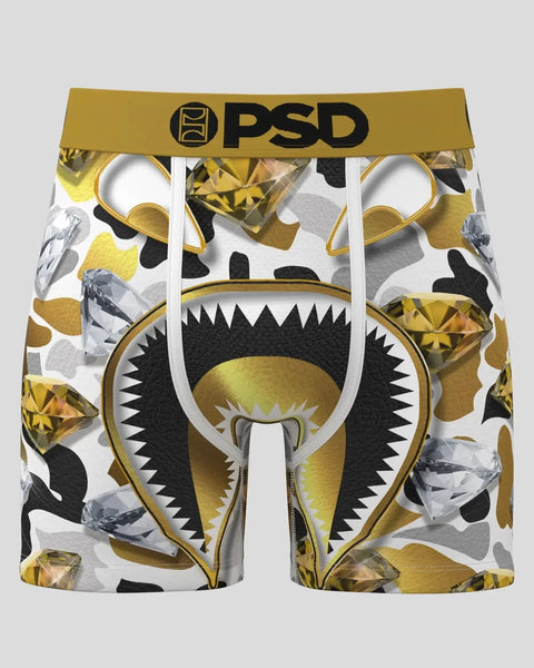 PSD boxer shorts with gold and black monster face design and gem pattern on white background.