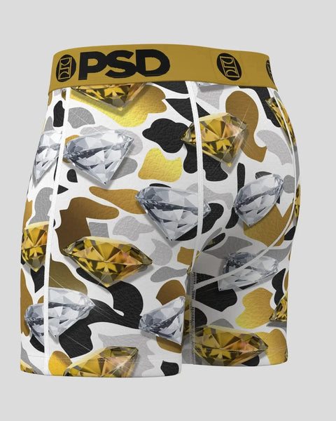PSD boxer briefs with gold waistband featuring yellow, black, and gray gemstone print on white background.