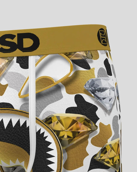 Gold and black Warface gaming headset with gold accents, white padding, and geometric design elements visible on ear cup and 