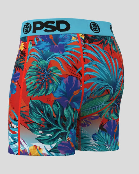 PSD boxer briefs with turquoise waistband and tropical leaf print in red, blue, green, and purple.