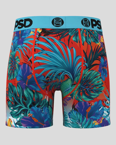 Men's boxer briefs with red base and multicolored tropical leaf print in blue, purple, and green, featuring blue PSD waistban