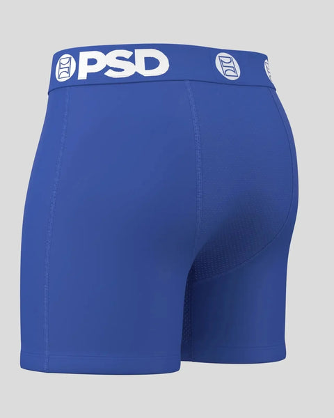 Royal blue PSD boxer shorts with white logo waistband and textured side panels.