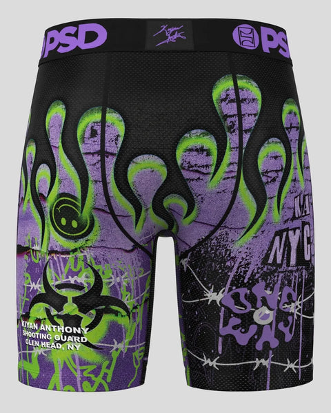 Black athletic shorts with neon green and purple alien/tentacle graphic design and PSD waistband.