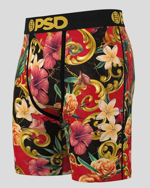 Three-pack of men's boxer briefs with gold baroque scrolls and colorful flowers on black and red background, black waistband 