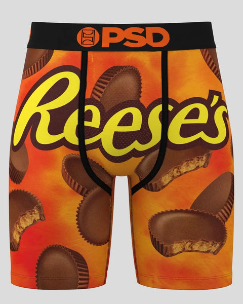 PSD brand boxer shorts with Reese's peanut butter cup pattern in brown and orange.