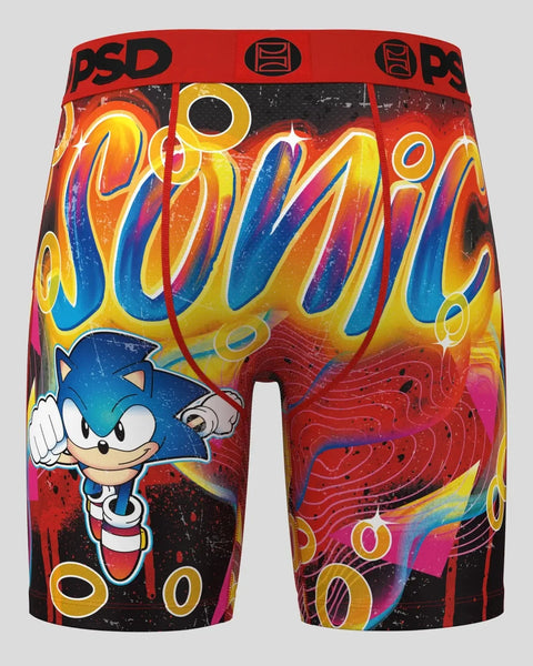 Red boxer briefs with Sonic character, colorful wave design, and yellow rings on multicolored background.