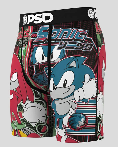PSD boxer briefs featuring Sonic the Hedgehog and Knuckles characters with blue and red colorway and grid pattern background.