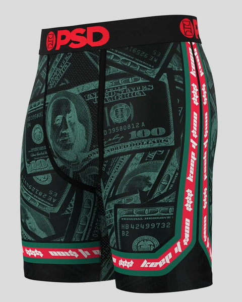 PSD boxer briefs with green and black dollar bill print, red waistband, and red side stripes.