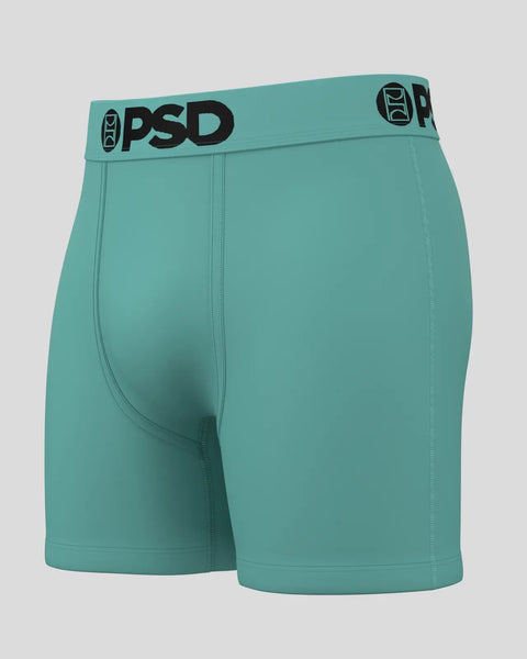 Teal PSD boxer briefs with black waistband logo and center seam detail.