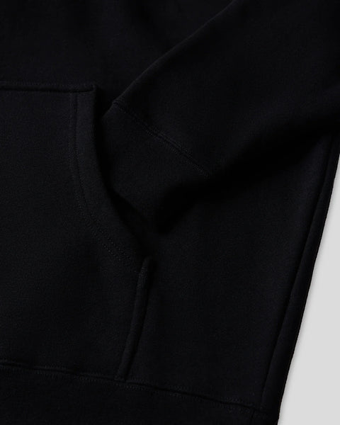Black hoodie with kangaroo pocket and drawstring, shown from torso detail view.
