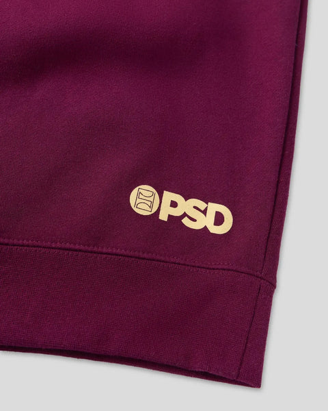 Maroon hoodie with gold PSD logo and emblem on chest.