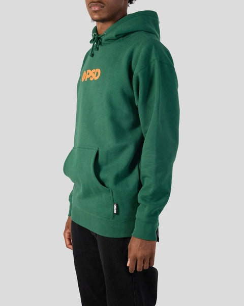 Man wearing a green hoodie with yellow PSD logo on chest and drawstring hood.