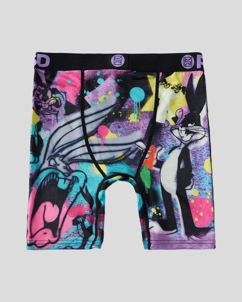 Colorful boxer briefs featuring Bugs Bunny and cartoon characters in neon pink, purple, cyan, and yellow on black background.