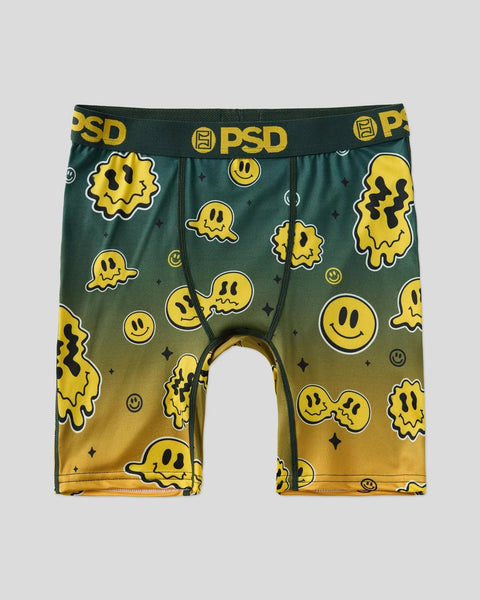PSD boxer briefs with yellow smiley faces and melting characters on dark green to gold gradient background.