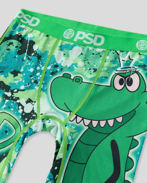 Green PSD underwear with cartoon crocodile character and splatter print design.