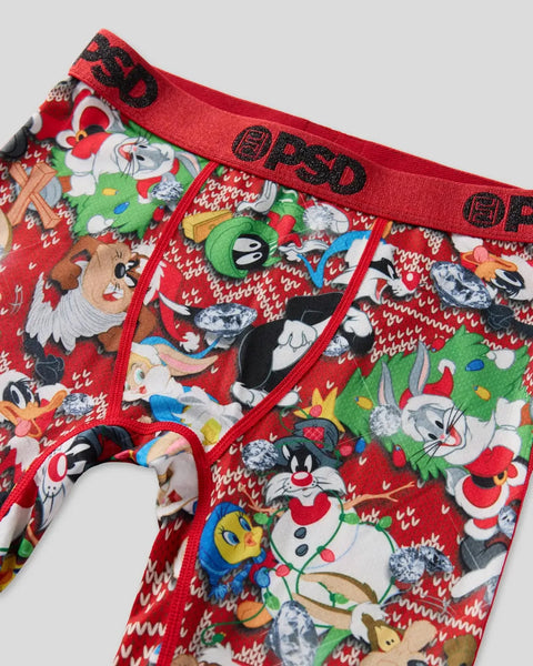 Red briefs with Looney Tunes characters in holiday outfits and knit pattern design.