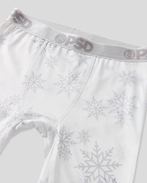 White briefs with gray snowflake pattern and elastic waistband with text branding.
