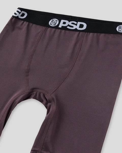 PSD brand underwear in deep purple with black waistband and white logo.