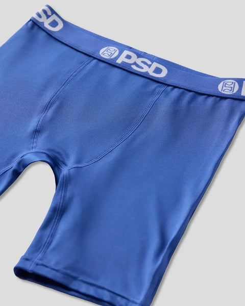 Royal blue underwear with PSD branding on waistband and center seam detail.