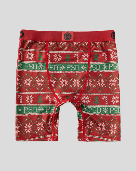 Red boxer briefs with green and white snowflake and tree knit pattern, elastic waistband with logo button.