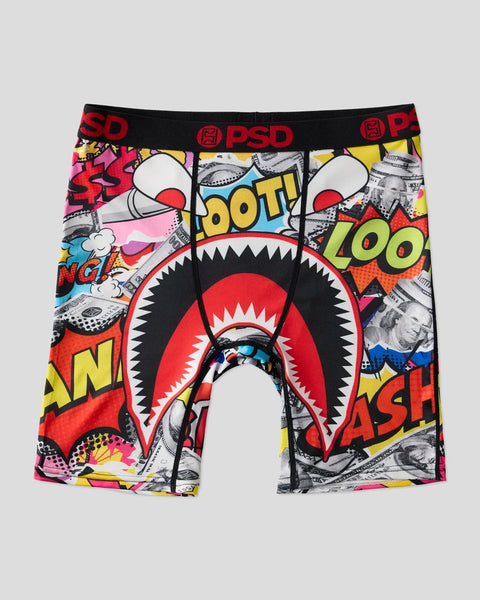 Three pairs of PSD boxer briefs featuring comic book-style graphics with shark mouth design and colorful pop art patterns.