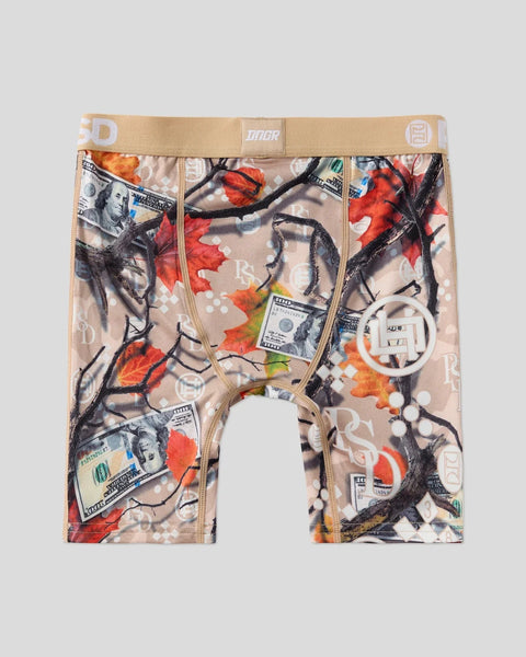 Tan boxer briefs with all-over print featuring red and orange leaves, black branches, dollar bills, and white circular design