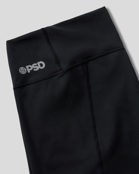 Black athletic leggings with PSD logo and side seam detailing.