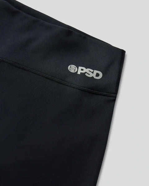 Black athletic briefs with PSD logo and waistband detail on gray background.