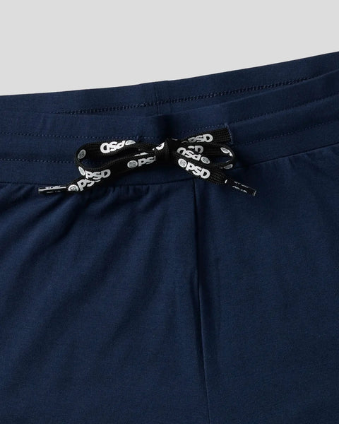 Dark blue modal sleep pants with drawstring waistband featuring branded black tape and metal aglets.