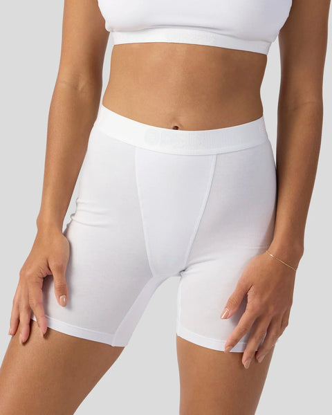 White crop top and shorts set in modal fabric with elastic waistband and fitted silhouette.