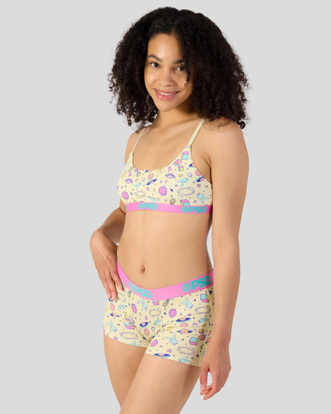 Yellow two-piece swimsuit with colorful space-themed print and pink trim with brand logo.