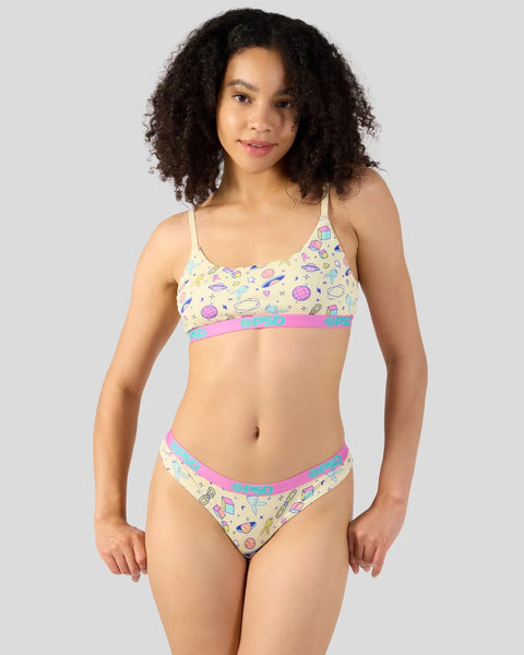 Yellow two-piece swimsuit with colorful planet and space icon print and pink and blue trim.